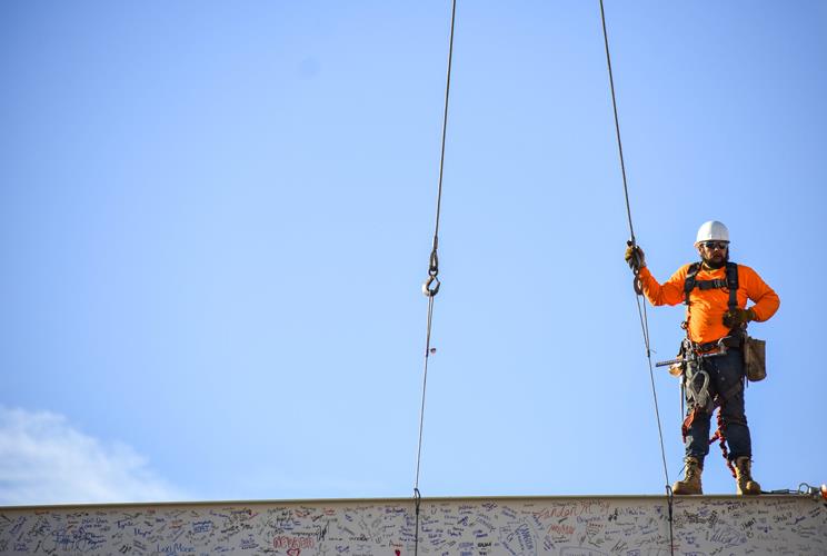 Worker on the beam